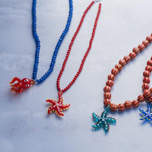 Cargar imagen en el visor de la galería, COLLAR PIEDRA ROJA ESTRELLA ROJA