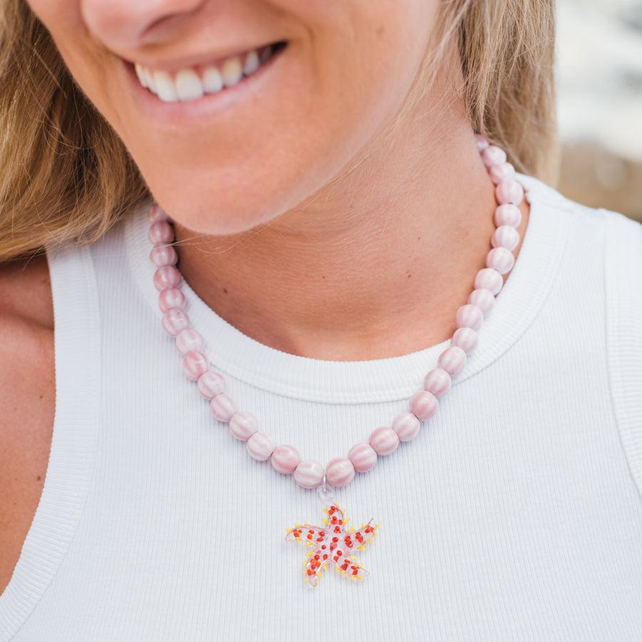 COLLAR CERAMICA ROSADA ESTRELLA TRANSPARENTE ROJA